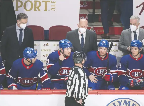  ?? GRAHAM HUGHES/THE CANADIAN PRESS ?? Following Tuesday’s OT loss, the Montreal Canadiens fired Kirk Muller, left, and Claude Julien. Dominique Ducharme takes over behind the bench.