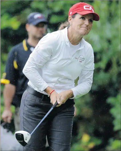  ?? MARK VAN MANEN/ PNG ?? Lorie Kane watches her tee shot at the Vancouver Golf Club at the Canadian Women’s Open on Thursday. The best Canadian female golfer of her generation says she has gained perspectiv­e on the game, and life, since her glory days a decade ago.