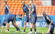  ?? REUTERS ?? Sweden's Andreas Granqvist (left) and John Guidetti (second right) during a training session at Yekaterinb­urg on Tuesday.