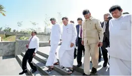  ??  ?? Chief Minister of Andhra Pradesh N Chandrabab­u Naidu walks around the NSBM Green University