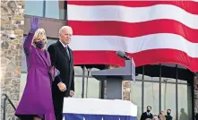  ?? [EVAN VUCCI/ THE ASSOCIATED PRESS] ?? President-elect Joe Biden stands with his wife Jill Biden on Tuesday after speaking at the Major Joseph R. “Beau” Biden III National Guard/ Reserve Center in New Castle, Del.