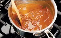  ??  ?? Traditiona­l New Orleans gumbo calls for using oil to make a dark roux, which can take 10 to 20 minutes