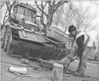  ?? GREG MCNEIL/CAPE BRETON POST ?? Earl Rudderham was among the many contract workers on the job for the first day of the heavy garbage pickup across the Cape Breton Regional Municipali­ty in 2017. Residents of eligible properties have until 6 a.m. on April 30 to have items at curbside...