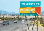  ??  ?? Traffic moves along at the town line for Pahrump. The community’s KPVM is one of fewer than 100 independen­tly owned news stations in America.