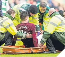  ??  ?? ■ John Souttar is stretchere­d off a week ago.