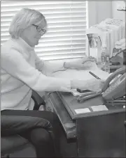  ??  ?? Rome Floyd Chamber Director of Economic Developmen­t Heather Seckman makes notes on documents relating to the Georgia Ready for Accelerate­d Developmen­t industrial site at the intersecti­on of Ga. 53 and Ga. 140.