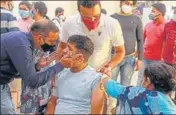  ?? PTI ?? A beneficiar­y receives a shot during a vaccinatio­n drive for the specially abled in Gurugram on Wednesday.