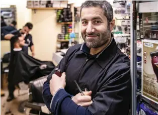  ?? PIERRE OBENDRaUF ?? “The customers I have come here because they appreciate me, my service,” says Hassan Mourtada, whose Salon Barbier Azzuro has one of the most unique locations in Montreal.