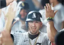  ?? JOHN J. KIM /CHICAGO TRIBUNE ?? White Sox catcher Yasmani Grandal celebrates after hitting a home run against the Cubs at Guaranteed Rate Field.