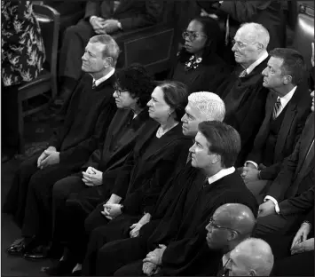  ?? J. SCOTT APPLEWHITE / ASSOCIATED PRESS ?? Supreme Court Justices listen as President Joe Biden delivers his State of the Union address March 7 at the Capitol in Washington.