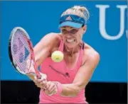  ?? MIKE STOBE/GETTY ?? After a slow start Tuesday, Angelique Kerber got on a roll against Roberta Vinci and won their quarterfin­al match.