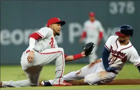  ?? JOHN BAZEMORE — THE ASSOCIATED PRESS ?? Former Philadelph­ia Phillies shortstop J.P. Crawford (2) was supposed to be the heir apparent to Jimmy Rollins.