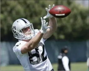  ?? JEFF CHIU — THE ASSOCIATED PRESS FILE ?? In this file photo, Oakland Raiders wide receiver Jordy Nelson catches a pass during practice at the team’s NFL football facility in Alameda Nelson has fit in right from the start since joining the Oakland Raiders this offseason and hopes to be the same kind of reliable receiver for Derek Carr as he was for Aaron Rodgers all those years in Green Bay.