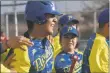  ?? ?? Teammates congratula­te Juan Arellano after he hit a home run on Tuesday (April 19).