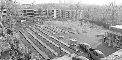  ?? COURTESY OF TESLA ?? Tesla Inc. tweeted this photo of solar panels being installed in what appears to be a parking lot adjacent to Hospital del Nino in Puerto Rico.