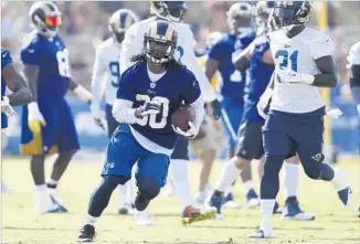  ?? Ryan Kang Associated Press ?? RAMS RUNNING BACK Todd Gurley, shown last month in Irvine, did not play last week against Dallas and sat out the exhibition season last year while recovering from knee surgery.