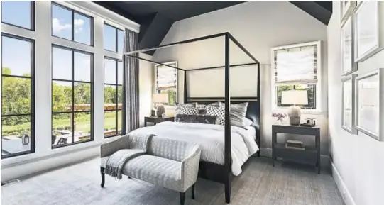  ?? Photo courtesy of Content That Works ?? Contempora­ry canopy beds have the traditiona­l four posts but do without the canopy.