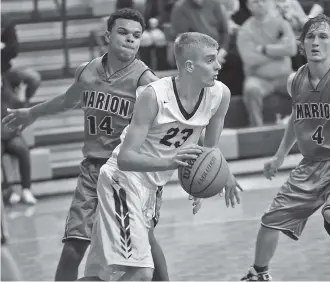  ?? STAFF FILE PHOTO BY TIM BARBER ?? Van Buren County’s Caden Mills (23), shown playing against Marion County in last season’s Region 3-A title game, is a player to watch in the Times Free Press Best of Preps Tournament this Thursday through Saturday at Chattanoog­a State. The 6-foot-6...