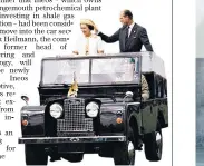  ??  ?? The Queen and the Duke of Edinburgh on an open top Land Rover Defender on tour in Melbourne in 1977