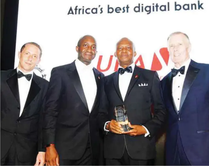  ??  ?? Group Managing Director/CEO, United Bank for Africa Plc, Mr. Kennedy Uzoka (2nd right) with Africa’s Best Digital Bank award conferred by Euromoney. Uzoka is flanked from left by Managing Director, Euromoney, Mr. John Orchard; General Manager, Energy...