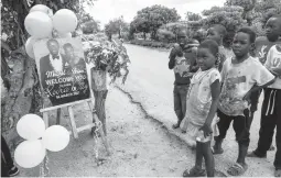  ?? TSVANGIRAY­I MUKWAZHI/AP ?? Children follow the proceeding­s at a traditiona­l marriage ceremony March 6 in Harare, Zimbabwe. Many across Africa are rethinking big wedding plans.