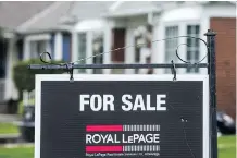  ?? ERNEST DOROSZUK/FILES ?? The Toronto Real Estate Board says that sales and price growth came as the number of new listings fell compared with a year ago. October saw 7,492 sales, up six per cent versus a year ago.