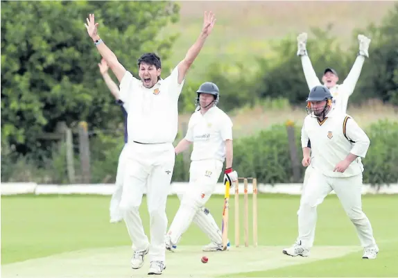  ??  ?? Greg Willott launches in to another lbw appeal during his highly-successful time with Leek.