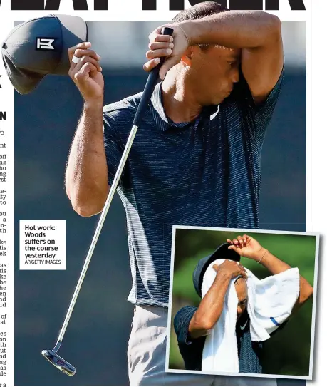  ?? AP/GETTY IMAGES ?? Hot work: Woods suffers on the course yesterday