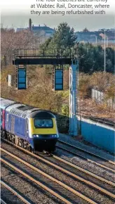  ?? TERRY CALLAGHAN. ?? On December 1, former Great Western Railway 43146 and 43143 pass Washwood Heath with a St Philips Marsh-Ely stock move. The Mk 3s were moving for store (although two will move north to Inverness for training), while the power cars then went to Brush...