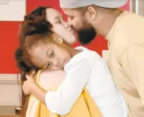  ?? COURTESY OF TLC ?? Hazel Cagalitan, Tarik Myers and his daughter, Ari, during episode six of “90 Day Fiancé.”