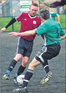  ?? Picture: Rebecca Holliday FM4218619 ?? Park Farm Rangers take on Smarden, green, at Pitchside on Saturday