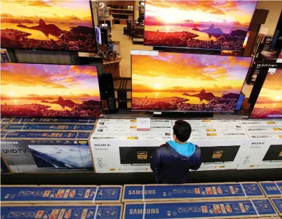  ?? CHARLIE RIEDEL/AP ?? When purchasing a TV, choose the largest one you can accommodat­e, says Tim Alessi of LG Electronic­s, “because I’ve never met anybody yet who has said, ‘Oh darn. I wish I bought a smaller TV.’”.