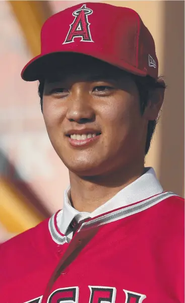  ?? Picture: GETTY IMAGES ?? HUGE SIGNING: Shohei Ohtani speaks on stage during his introducti­on to the Los Angeles Angels of Anaheim at Angel Stadium on Saturday.