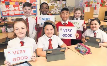  ??  ?? Top marks Pupils were delighted by the recent inspection results