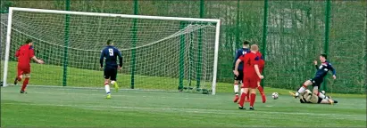  ??  ?? Craig MacEwan rounds off the scoring by netting Saints’ fourth goal.