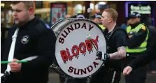  ??  ?? The Bloody Sunday memorial march passed through Glasgow city centre