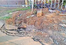  ??  ?? OPEN trenches have allegedly damaged a portion of the road in Reservoir Hills.