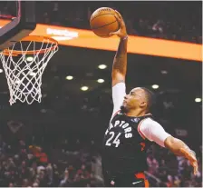  ?? JOHN E. SOKOLOWSKI/USA TODAY SPORTS ?? Toronto Raptors guard Norman Powell isn’t big by NBA standards, but he sure can get above the rim.