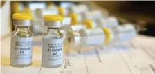  ?? AP file ?? VIRUS VACCINE: Vials contain a COVID-19 vaccine being developed by Johnson & Johnson. Once approved, the vaccine will go nursing homes for free.