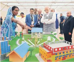  ?? PHOTO: PTI ?? Prime Minister Narendra Modi visits a stall during the inaugurati­on of Krishi Unnati Mela 2018 in New Delhi on Saturday