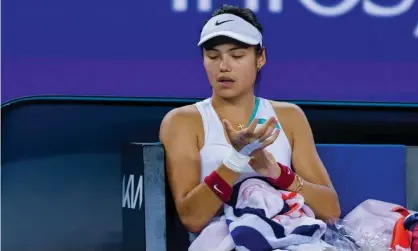  ?? ?? Emma Raducanu’s right hand had to be strapped during her defeat to Danka Kovinic due to painfulbli­sters. Photograph: Andy Cheung/ Getty Images