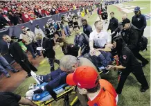  ?? THE ASSOCIATED PRESS ?? Former Texans head coach Gary Kubiak is carted off the field on a stretcher after suffering a minor stroke three seasons ago.