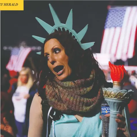  ?? BRIAN SNYDER / REUTERS ?? A supporter arrives for a rally with President Donald Trump and Republican Sen. Kelly Loeffler Monday, on the eve of Georgia's runoff election.