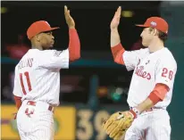  ?? MATT SLOCUM/AP ?? Jimmy Rollins, left, and Chase Utley are on the Baseball Hall of Fame ballot this time and both have a chance to make it, but for different reasons.