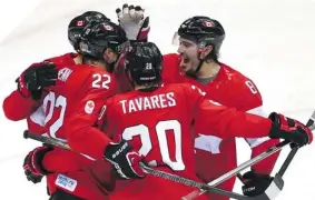  ?? STREETER LECKA/GETTY IMAGES ?? OUT OF THE BLOCKS After a listless start, Canada kicked it into high gear to dominate Norway in the second period, skating to a 3-1 victory.