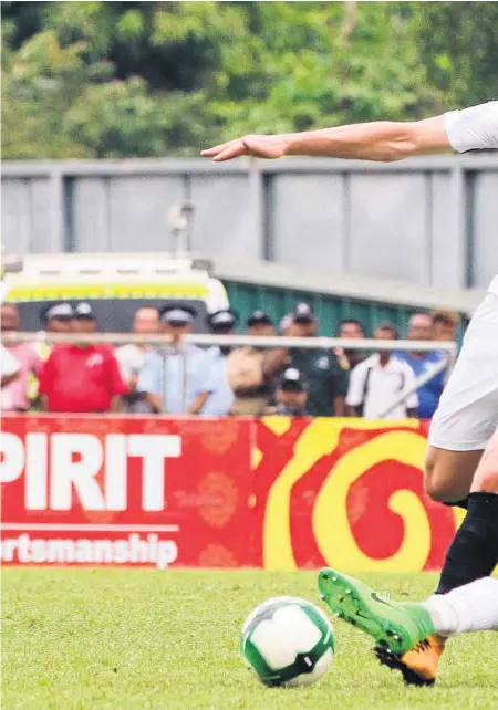  ??  ?? All Whites forward Monty Patterson attempts to evade the Solomons defence during yesterday’s 2-2 draw in Honiara.