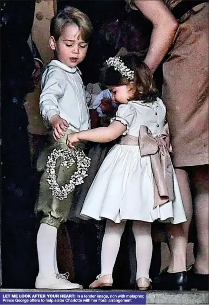  ??  ?? LET ME LOOK AFTER YOUR HEART: In a tender image, rich with metaphor, Prince George offers to help sister Charlotte with her floral arrangemen­t