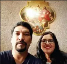  ?? PHOTO COURTESY RACHEL TOVAR VIA AP ?? In this Dec. 2017, photo provided by Rachel Tovar, right, poses with her husband Arturo Tovar at a Catholic cathedral in Mexico City. Rachel Tovar, a former worker of the Fullmer Cattle Co., a western Kansas calf ranch, told the Associated press that...