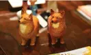  ?? Eamonn M McCormack/Getty Images ?? Miniature porcelain corgis from The Crown auction at Bonhams. Photograph: