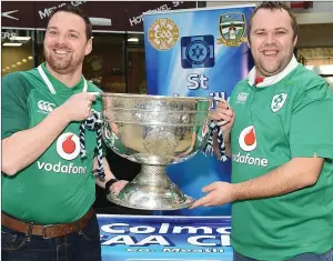  ??  ?? Steven and Chris Reilly with the Sam Maguire cup when it visited Southgate Shopping Centre with St Colmcilles GFC